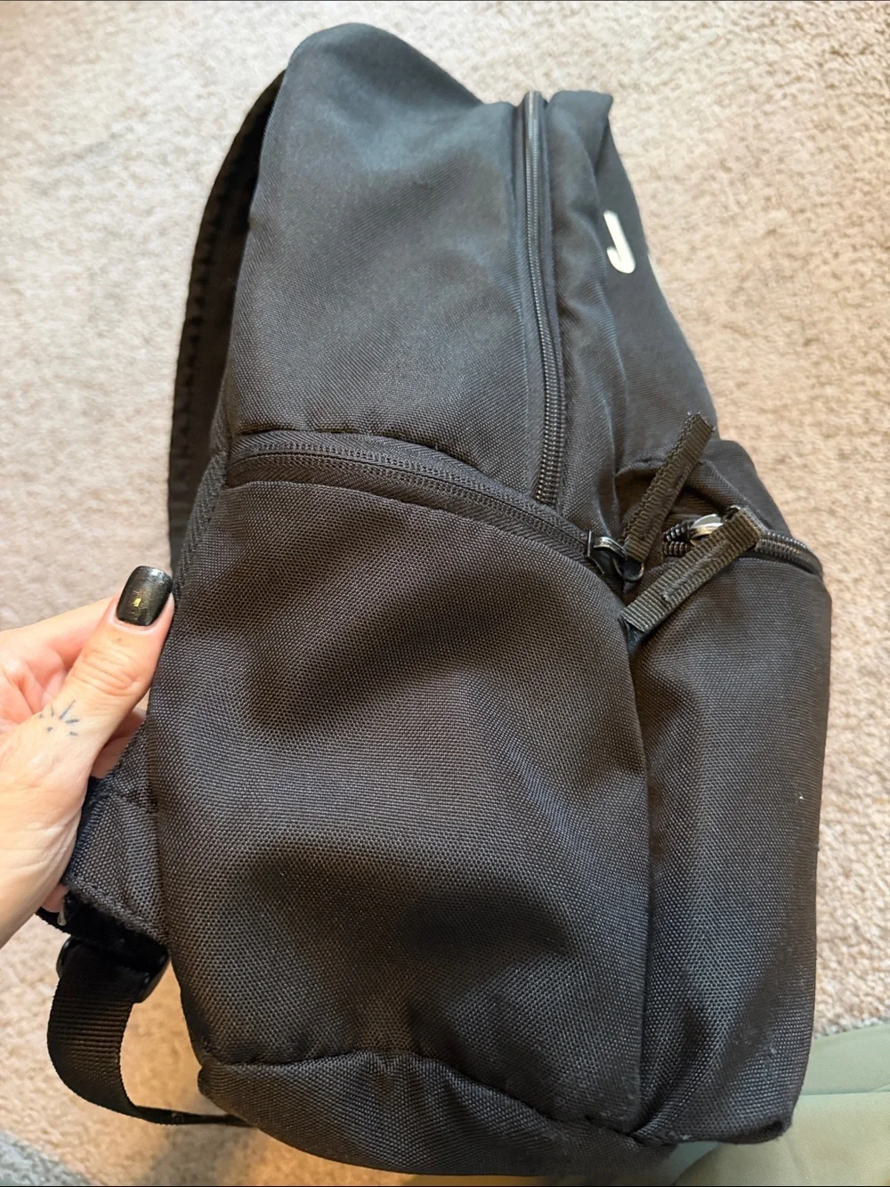 Black Jordan Backpack with Red Jumpman and White Lettering
